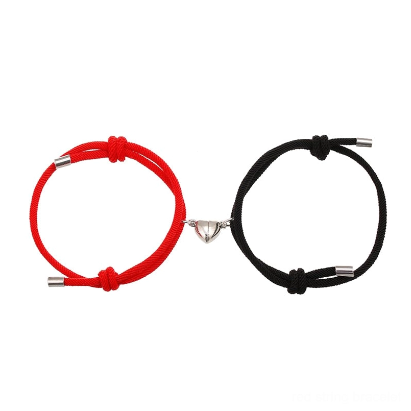 Red and black magnetic couple bracelets with heart magnetic clasp, woven rope, flat lay