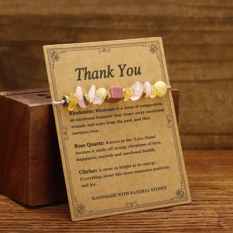 Natural healing crystal bracelet featuring rose quartz citrine rhodonite on kraft thank you card