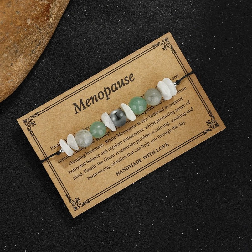 Menopause support bracelet with labradorite moonstone aventurine beads on card overhead view