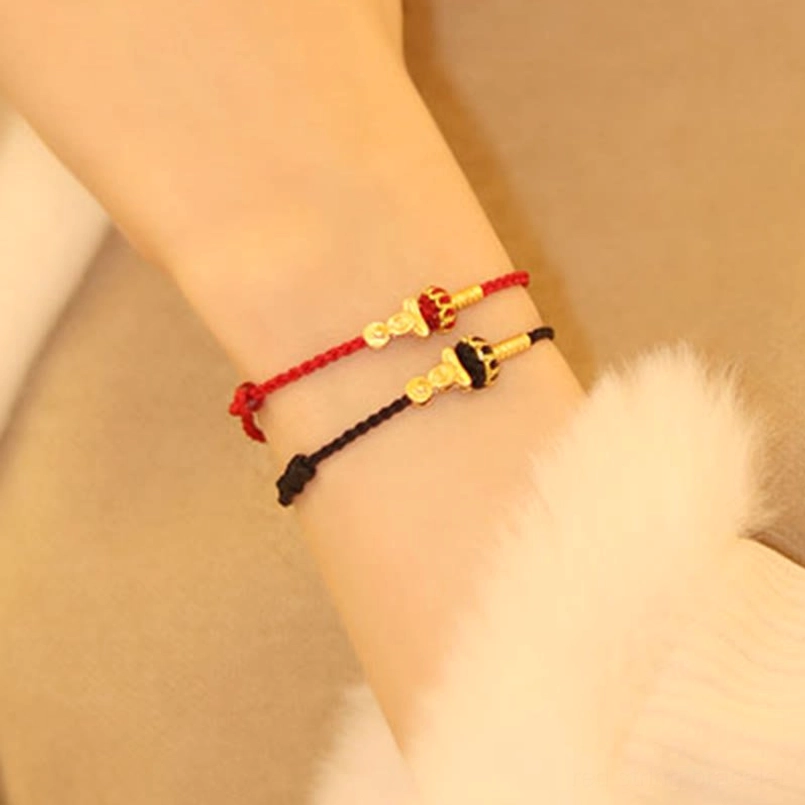 Red string bracelet for daily spiritual protection and mindfulness practice wearing guide