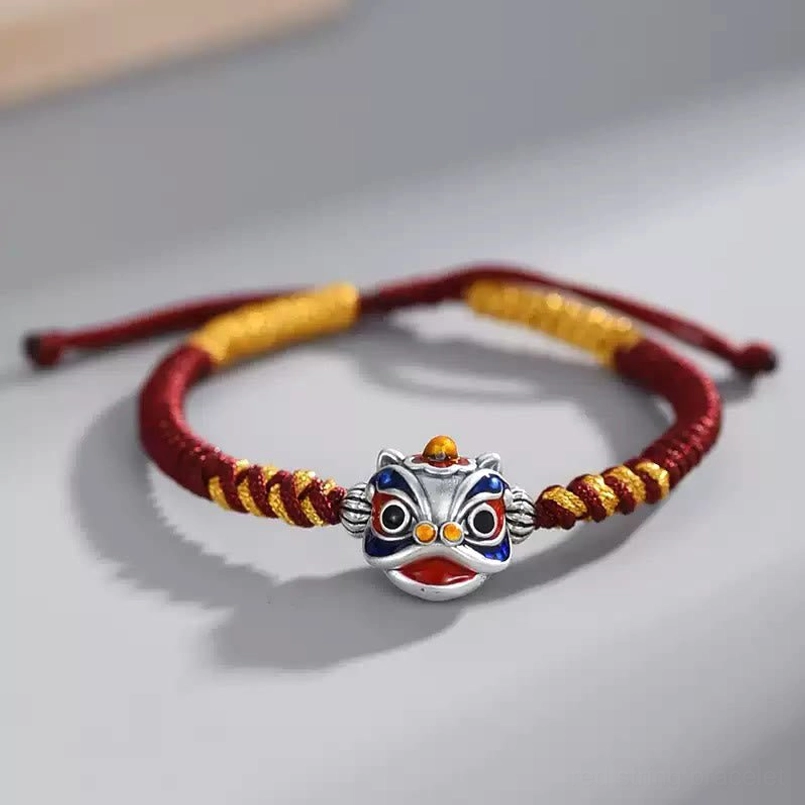 Red dancing lion luck bracelet with wine-red yellow woven cord and adjustable pull knot