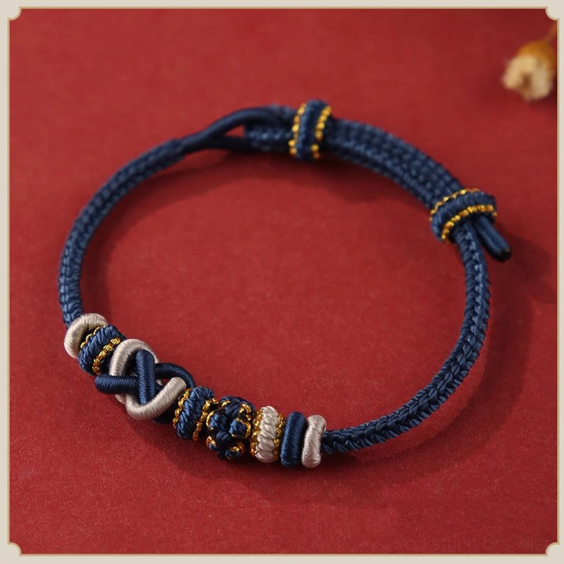 Dark Blue Peace Knot Red String Protection Bracelet Flat Lay View