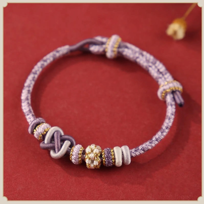 Dark Purple Handcrafted Peace Knot Red String Bracelet Product Photo