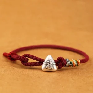 Dark red 999 sterling silver fu zongzi red string bracelet front flat view