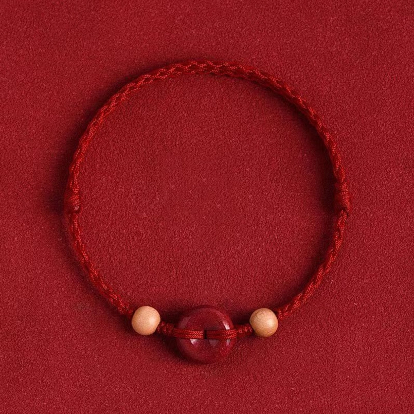 Dark red and black rope peach wood cinnabar peace buckle bracelet comparison