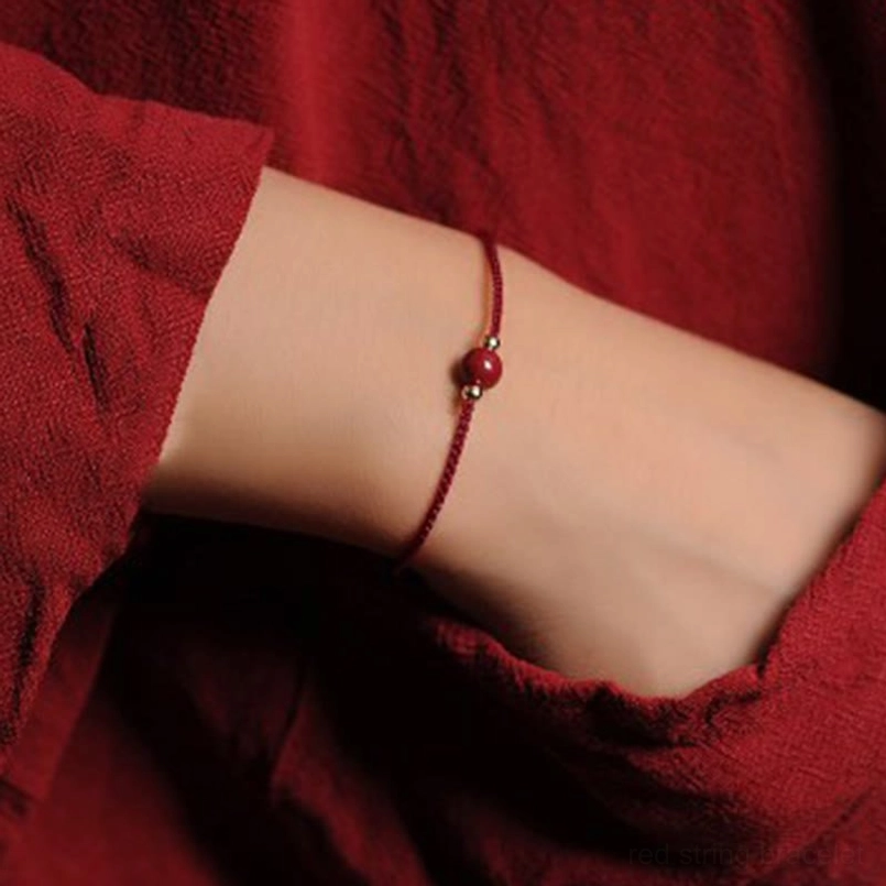 Dark red cord single cinnabar bead braided bracelet top view