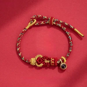 Dark red gold braided Buddha knot red string bracelet with black projection stone charm