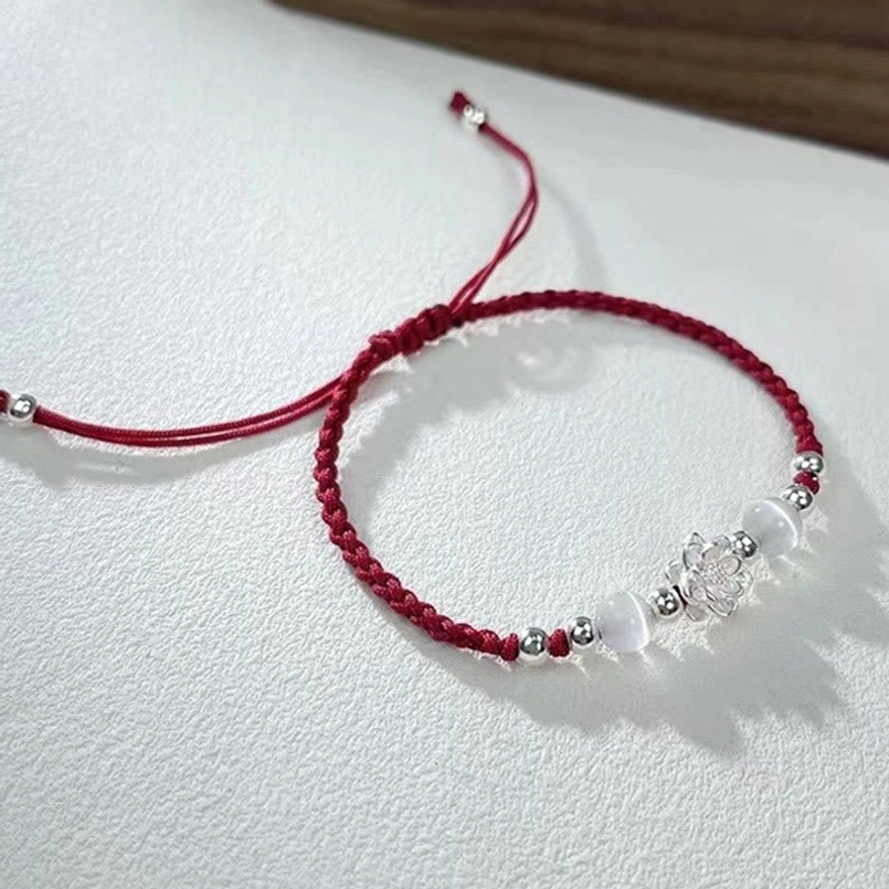 dark red lotus red string bracelet with silver charm product display