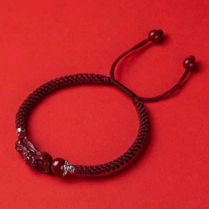 Dark red adjustable Pixiu cinnabar bracelet with protective red string