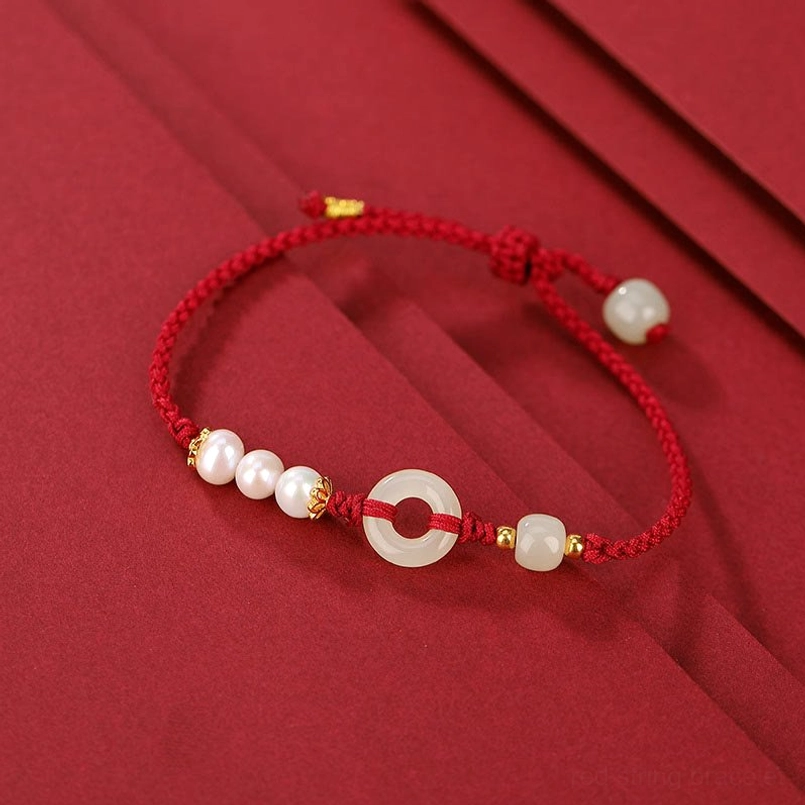 Dark red string Hetian jade peace buckle bracelet with white pearls