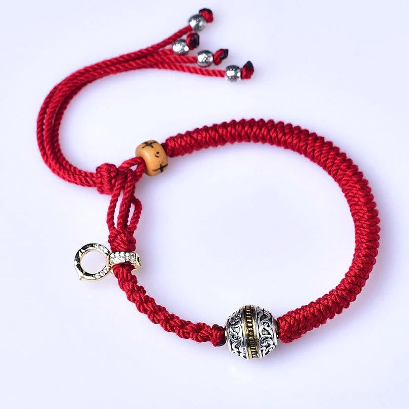 Red string diamond knot braided bracelet front view on white background