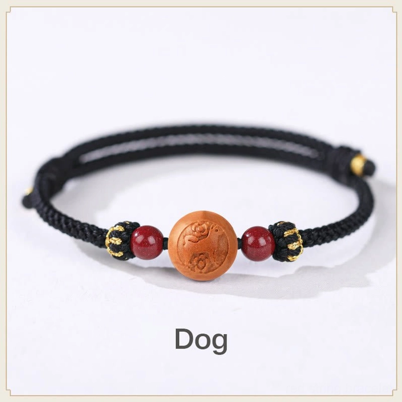Dog zodiac peach wood black rope bracelet - loyal honest protective fortune talisman