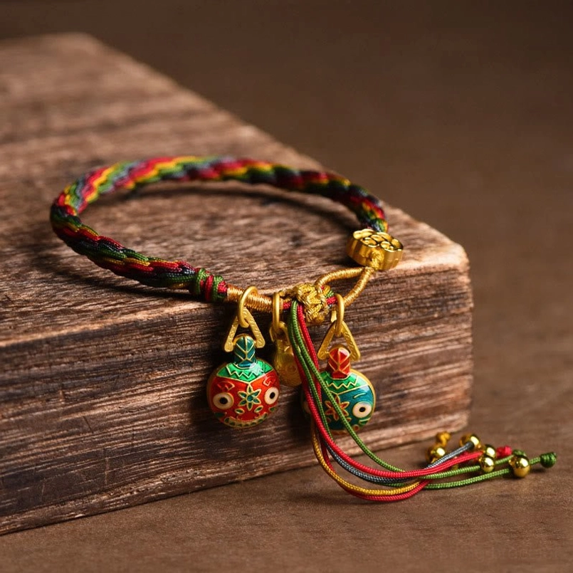 Dual Gold Swallowing Beast charm braided bracelet side view