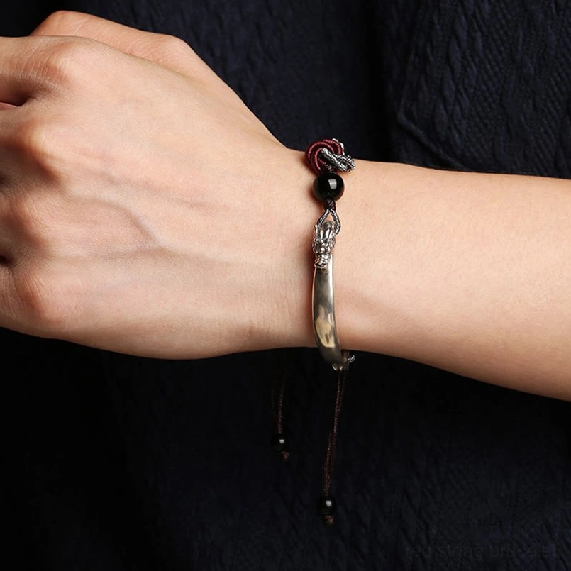 Handmade mandala knot detail with wine red and silver mixed braided cord on dragon bracelet