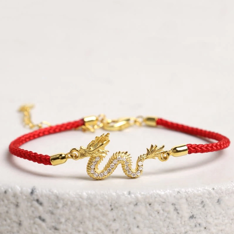 925 Sterling Silver Dragon Red Rope Bracelet flat lay with extender chain