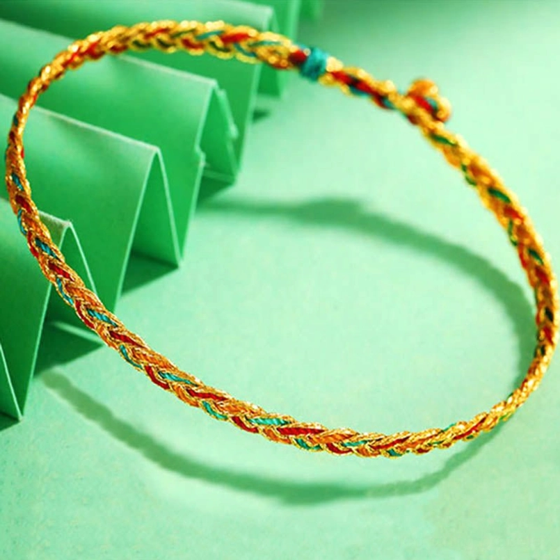Close-up macro view of dragon scale bracelet knot showing twisted braided strands and colorful decorative beads