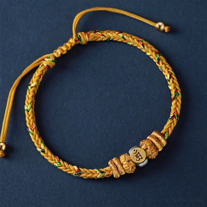 Dragon Snake zodiac natal buddha red string bracelet with woven cord and metal charm detail