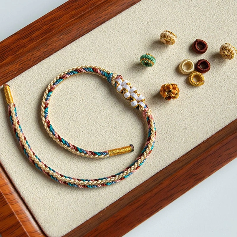 Dunhuang peach blossom bracelet set with detachable decorative knots and two adjustable braided straps