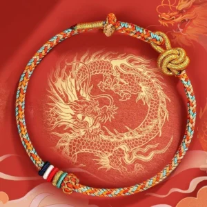 Dunhuang handwoven multicolor protection bracelet with golden knot detail on red background