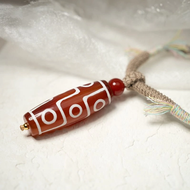 Dzi Bead Red String Bracelet Detail Side View