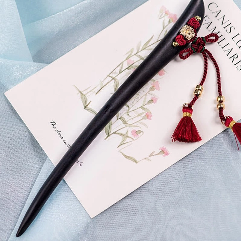 Ebony red string tassel hairpin complete product view elegant styling