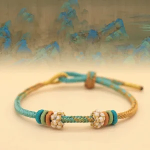 eight thread peace knot braided luck bracelet teal gold-brown with flower beads traditional design