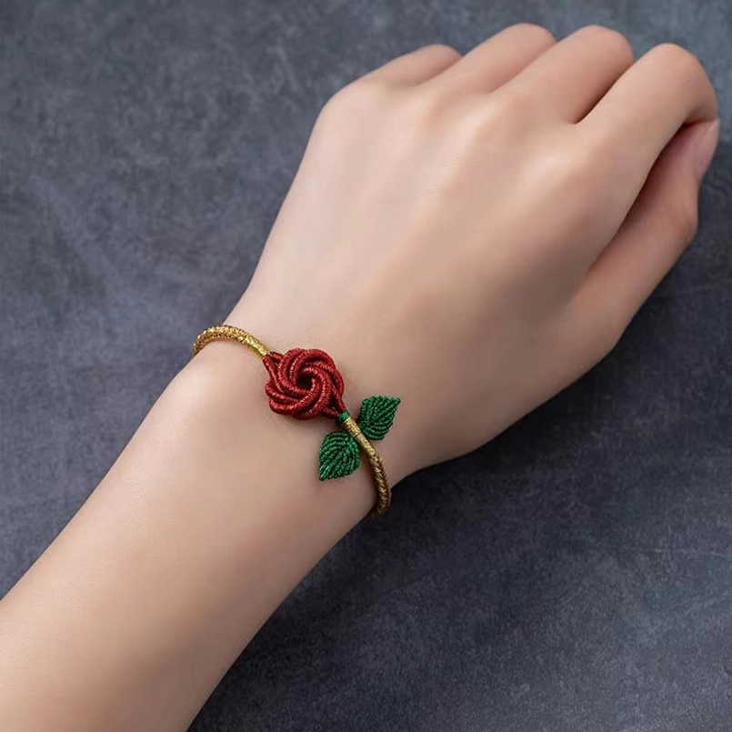 Artisanal eight thread peace knot lucky bracelet with natural cord materials and rose accent
