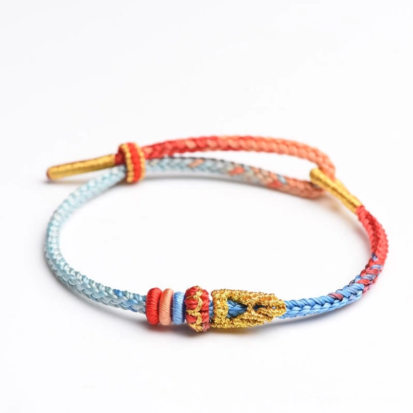 Skyblue and red eight thread peace knot bracelet with protective Tibetan knot styling