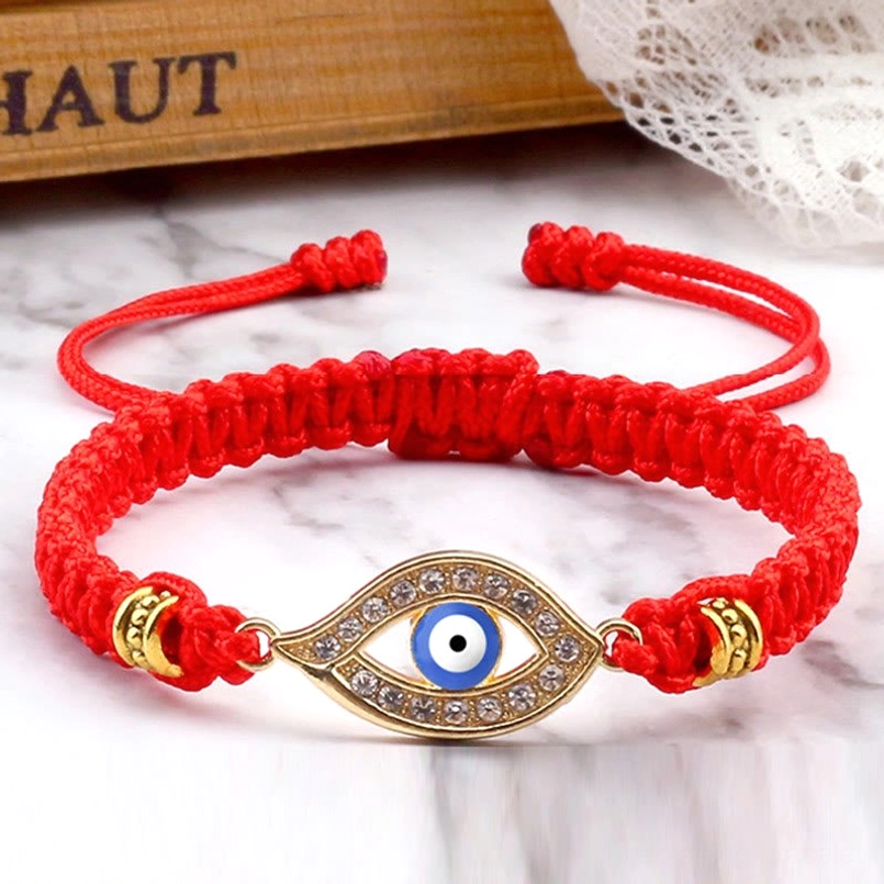 Red pink evil eye charm bracelet gold border embellishment