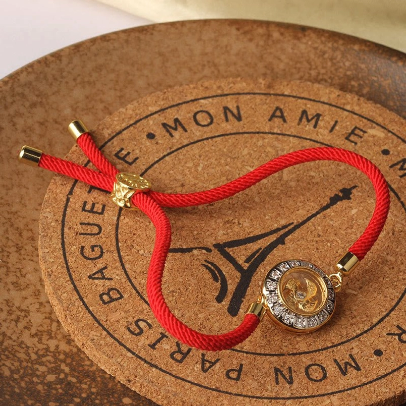 Feng shui red string windmill bracelet alternative angle showing charm detail