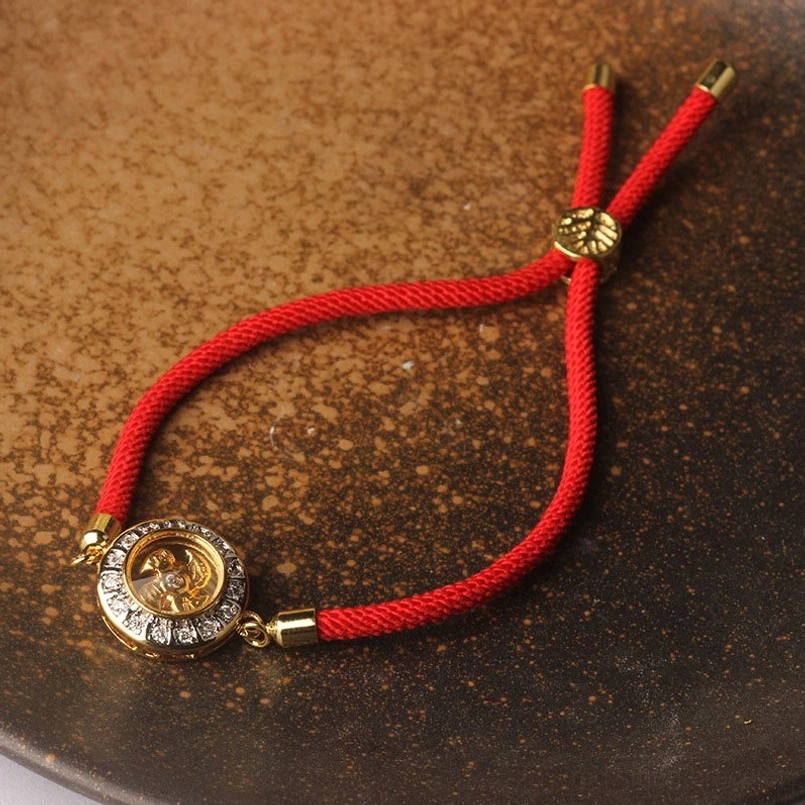 Premium rotating windmill red string bracelet with adjustable closure knot