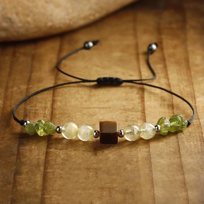 Adjustable Find Your Joy bracelet showing peridot citrine and tiger eye gemstone beads