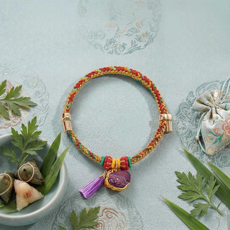 Five-color wearable lucky bracelet styled with traditional Hanfu embroidered textile and foliage