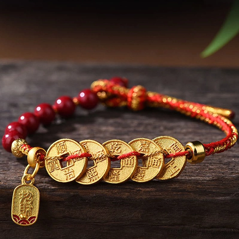 Five-emperor coins bracelet with ancient copper coins and engraved lucky tag wooden table