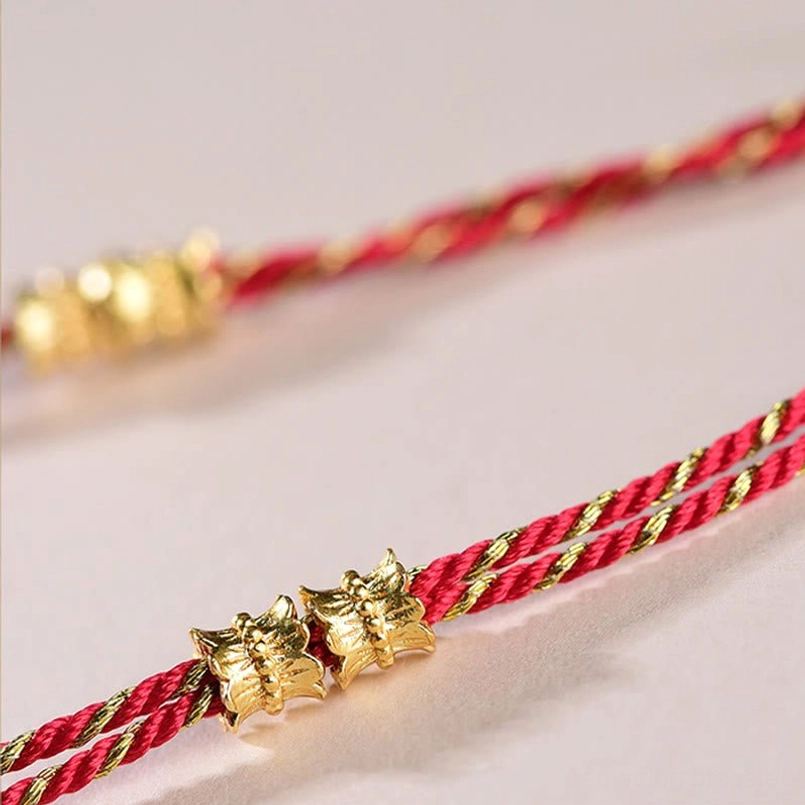Red string bracelet with five ancient emperor coins for Feng Shui protection and wealth