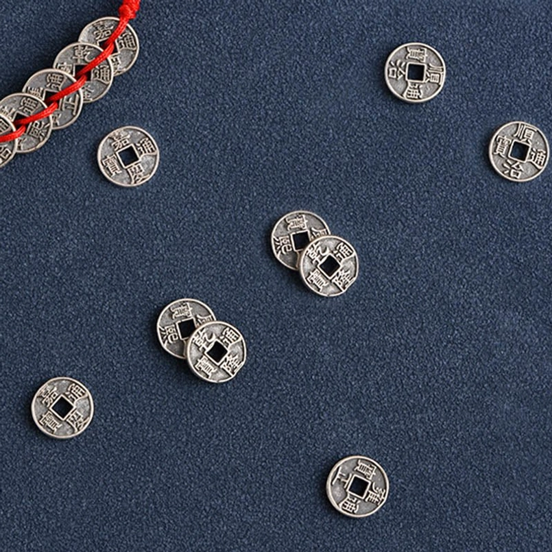 Five Emperor Coins red string bracelet worn on wrist showing actual fit and comfort on body