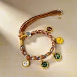 Five Gods of Wealth Tibetan multicolor rope bracelet with five enamel charms flat lay