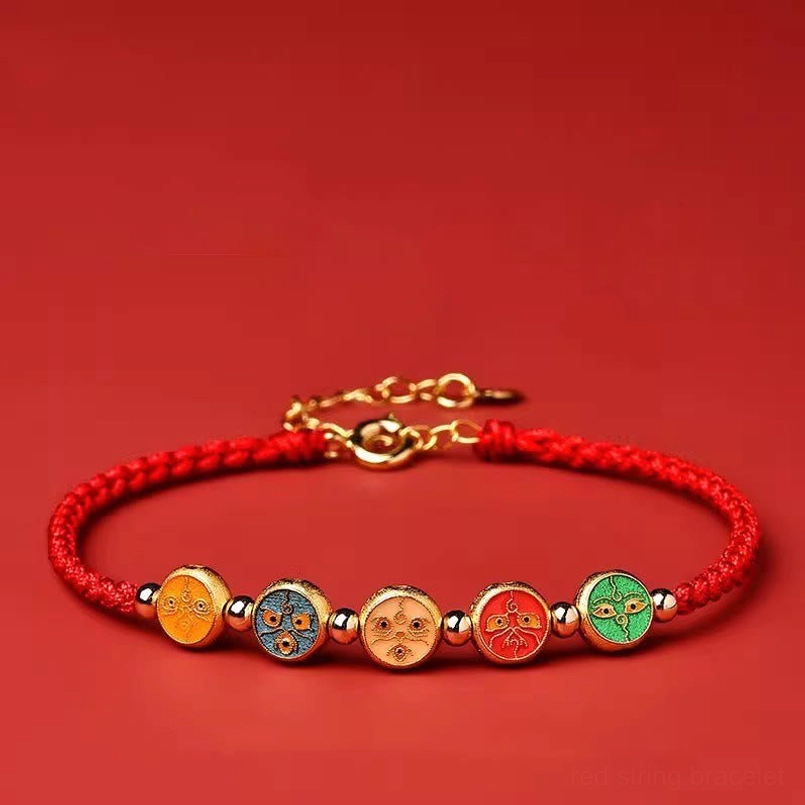 five ways god of wealth red string bracelet close up detail of silver charm