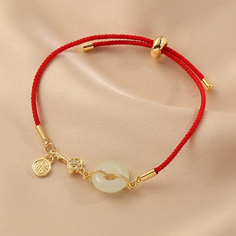 Fortune red string bracelet with smooth jade peace buckle and cubic zirconia accents