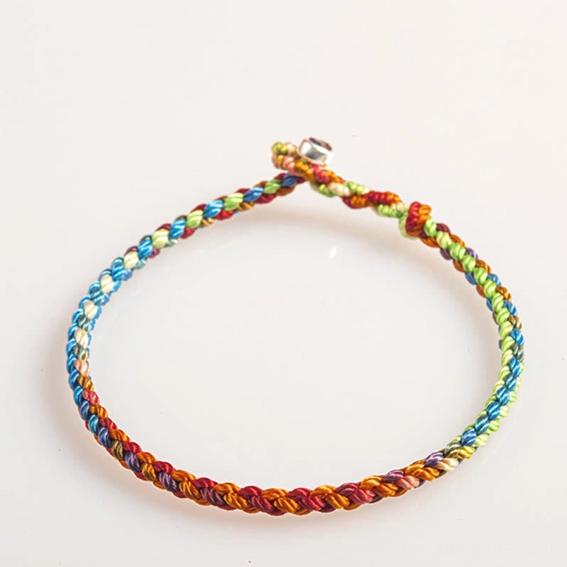 Lucky multicolored bracelet with small bell charm bright rainbow threads