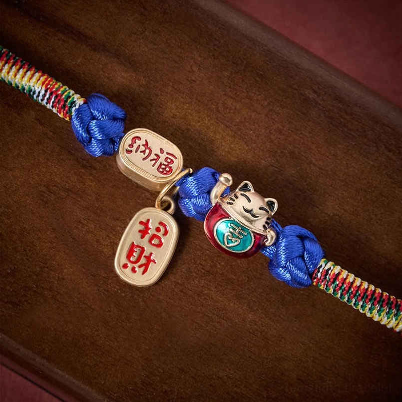 Handcrafted Fu character pet collar showing multicolor woven design and spiritual charm detail