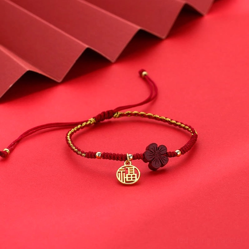 Minimalist red string Fu bracelet with cinnabar flower and gold charm