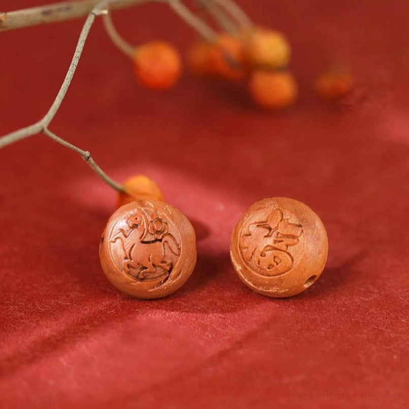 Goat zodiac peach wood fortune bracelet with red braided rope - gentleness and harmony talisman