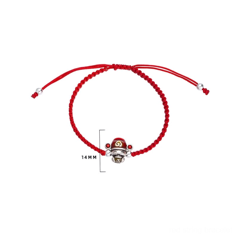 Red God of Wealth bracelet flat lay showing 14mm silver fortune charm and adjustable cord on white background