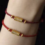 999 gold amulet red string bracelet worn on two wrists - handmade lucky charm