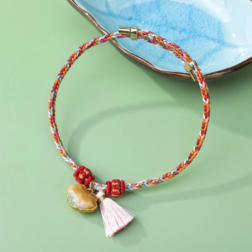 Gold five-color braided cord luck bracelet with lock charm and white Song brocade tassel product shot