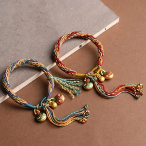 Pair of gold pixiu family blessing reincarnation knot bracelets with multicolor braided cord and enamel charms