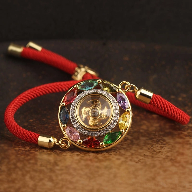 Good luck charm copper jewelry set with rotating zircon stone and red cord bracelet