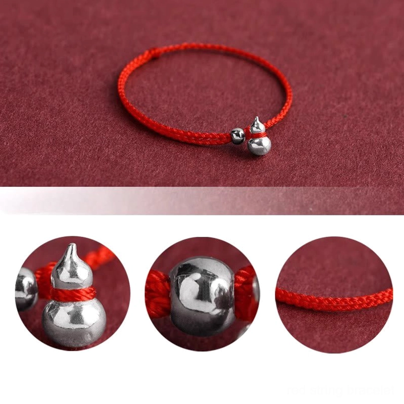 lucky fortune gourd bracelet low angle side view with red woven cord