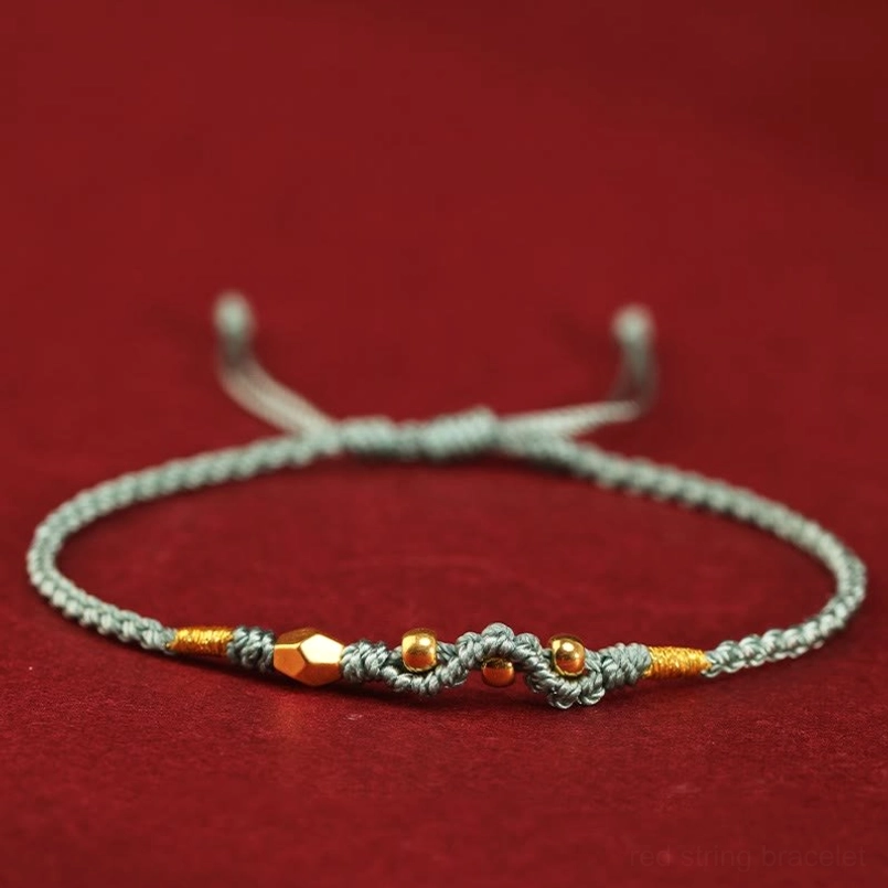 Green 999 gold mini three bead snake red string bracelet top view